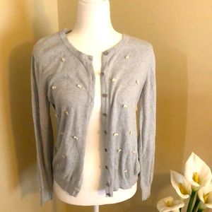 Grey and off white bowed sweater